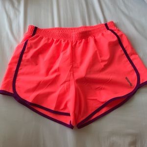 bright orange reebok shorts, large, worn once